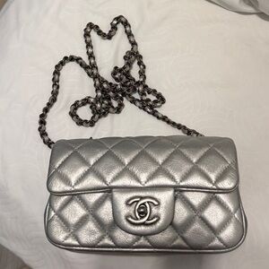 CHANEL Quilted Extra Mini Flap Bag with Chain Strap in Metallic Silver